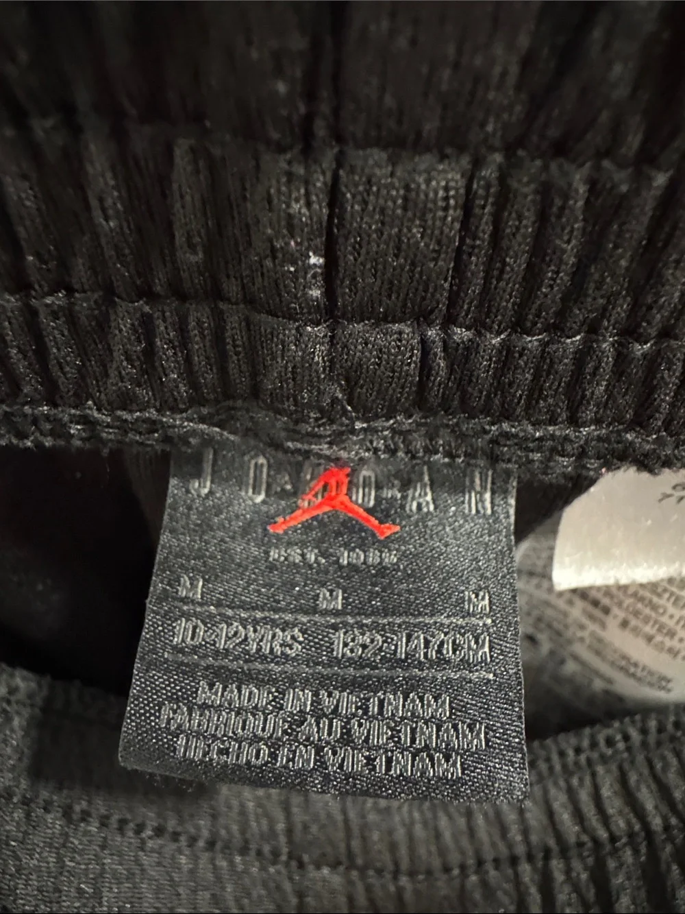 Jordan Black Athletic Shorts with Red Jumpman and White AIR Text